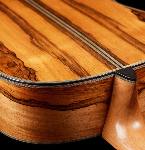 The heel, back binding and purfling of a 2025 Ariel Ameijenda classical guitar made of cedar and CSA rosewood