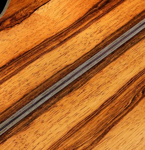 The back center seam of a 2025 Ariel Ameijenda classical guitar made of cedar and CSA rosewood