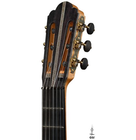 The headstock of a 2025 Ariel Ameijenda "70th Anniversary - Lightning Strikes" classical guitar made of cedar and CSA rosewood