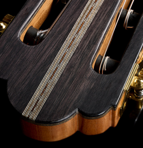 The headstock veneer with inlay of a 2025 Ariel Ameijenda "70th Anniversary - Lightning Strikes" classical guitar made of cedar and CSA rosewood