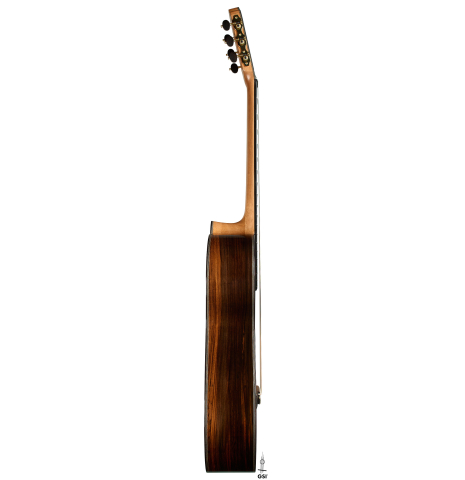 The side of a 2025 Ariel Ameijenda "70th Anniversary - Lightning Strikes" classical guitar made of cedar and CSA rosewood