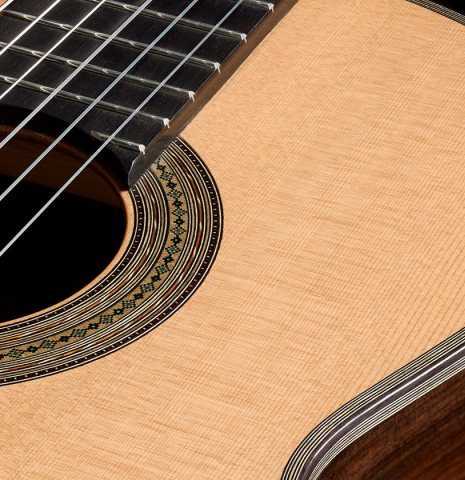 The soundboard of a 2025 Ariel Ameijenda "70th Anniversary - Lightning Strikes" classical guitar made of cedar and CSA rosewood
