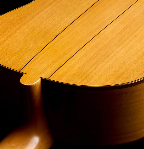 The neck and heel joint, back binding and purfling of a 2026 Ariel Ameijenda "1885 Torres - SE 81" classical guitar made of spruce and cypress