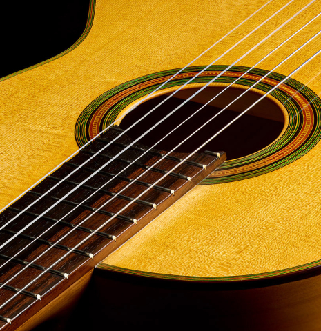 The fingerboard and top of a 2026 Ariel Ameijenda "1885 Torres - SE 81" classical guitar made of spruce and cypress