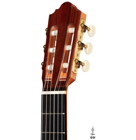 The headstock of a 2022 Mario Aracama classical guitar made of spruce and African rosewood