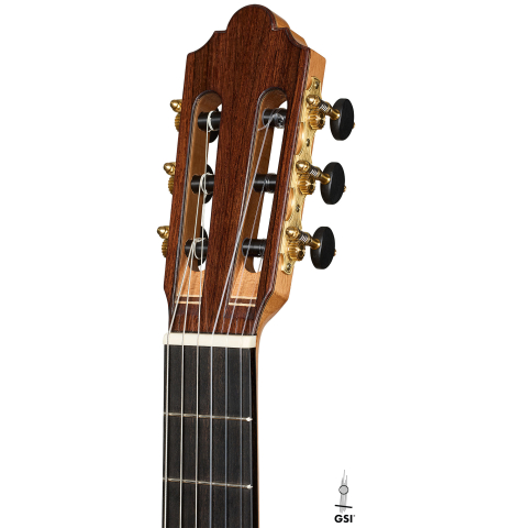 The headstock of a 2026 Mario Aracama classical guitar made of spruce and African rosewood