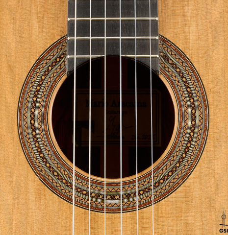 The rosette of a 2025 Mario Aracama classical guitar made of cedar and cocobolo