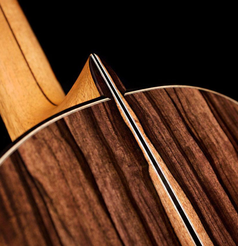 The heel, back binding and purflings of a 2019 Mario Aracama classical guitar made of spruce and exotic Kamagong