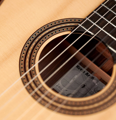 Close-up detail of the rosette of a 2019 Kevin Aram "Emily" classical guitar made of spruce and Indian rosewood