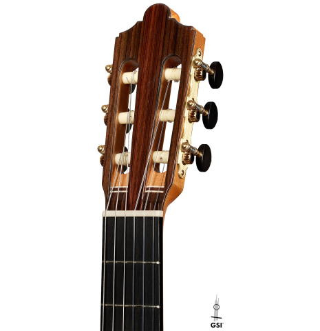 The headstock of a 2025 Mario Aracama classical guitar made of spruce and Indian rosewood