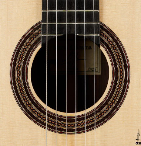 The rosette of a 2025 Mario Aracama classical guitar made of spruce and Indian rosewood