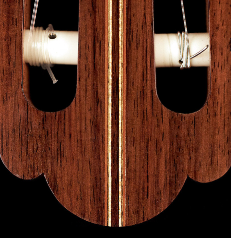 The headstock inlay of a 1999 Kevin Aram "Marina" classical guitar made with spruce and Indian rosewood.