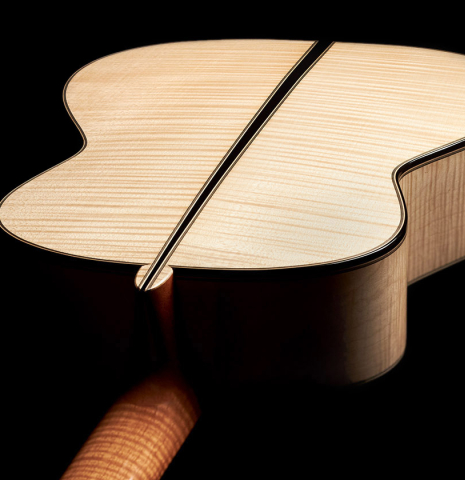 The back and sides of a 2023 Mario Aracama classical guitar made of spruce and maple.