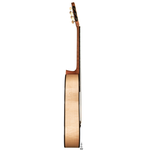 The side of a 2023 Mario Aracama classical guitar made of spruce and maple.