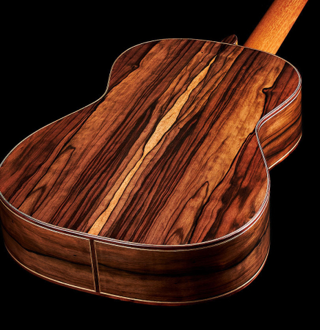 The back and sides at the foot of a 2024 Mario Aracama classical guitar made of cedar and Kamagong