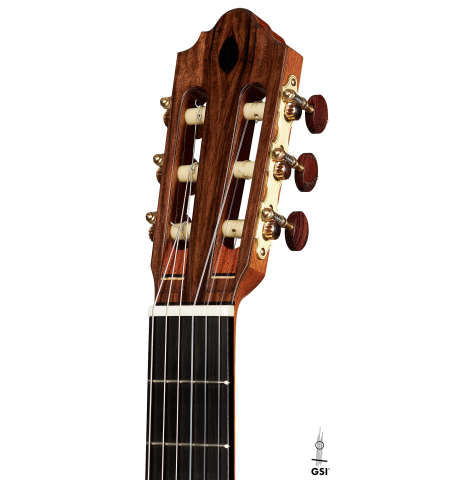 The headstock of a 2024 Mario Aracama classical guitar made of cedar and Kamagong