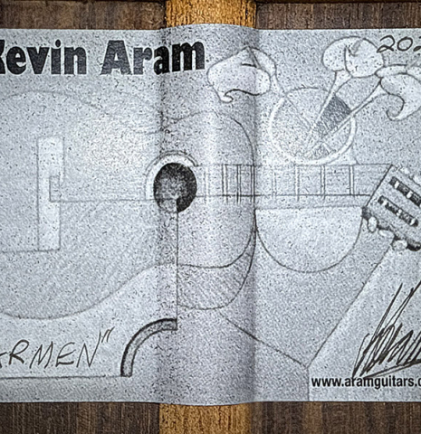 The label of a 2021 Kevin Aram "Carmen 640" classical guitar made of spruce and Indian rosewood