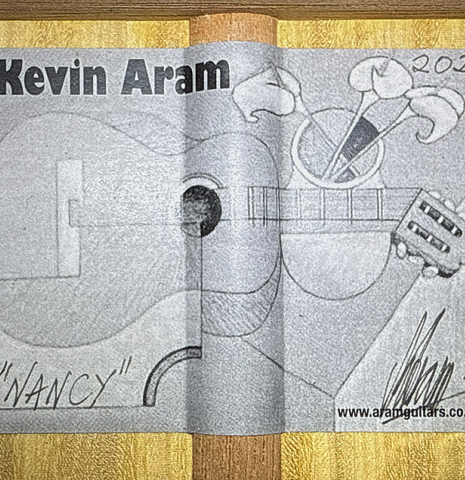 The label of a 2021 Kevin Aram "Nancy" classical guitar made of spruce and satinwood