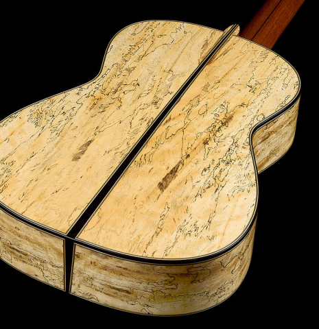The back and sides at the foot of a 2025 Mario Aracama classical guitar made of spruce and Tamarind