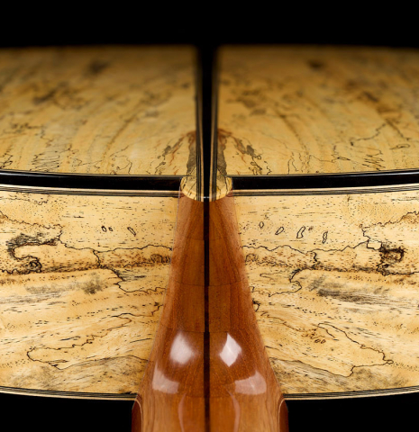 The back and sides at the heel joint of a 2025 Mario Aracama classical guitar made of spruce and Tamarind