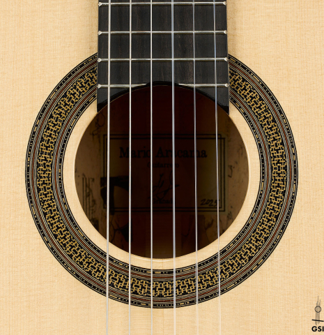 The rosette of a 2025 Mario Aracama classical guitar made of spruce and Tamarind