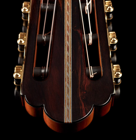 The headstock with inlays of a 2022 Ariel Ameijenda "Confessional" made of alerce and CSA rosewood