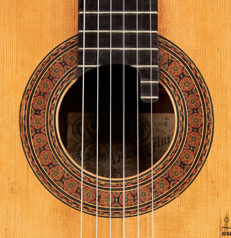 The rosette of a 1903 Vicente Arias classical guitar made with spruce and CSA rosewood
