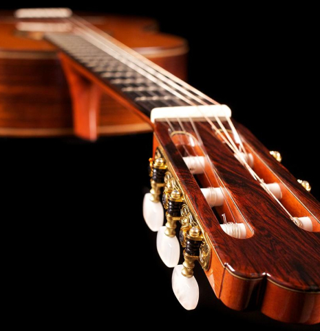 The headstock of an Asturias &quot;Custom C&quot; a 640 mm scale classical guitar made of cedar and Indian rosewood