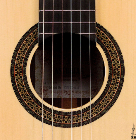 The rosette of an Asturias "Custom S" classical guitar made of spruce and Indian rosewood