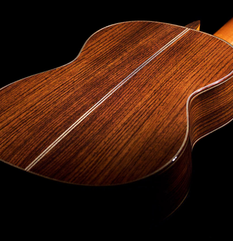 The back and sides of an Asturias "Custom S" classical guitar made of spruce and Indian rosewood