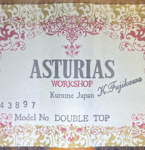 The label of a 2022 Asturias &quot;Double Top&quot; classical guitar made of cedar and Indian rosewood