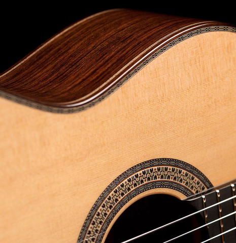 The soundboard, rosette and purfling of a 2022 Asturias "Custom C" classical guitar made with 630 mm scale
