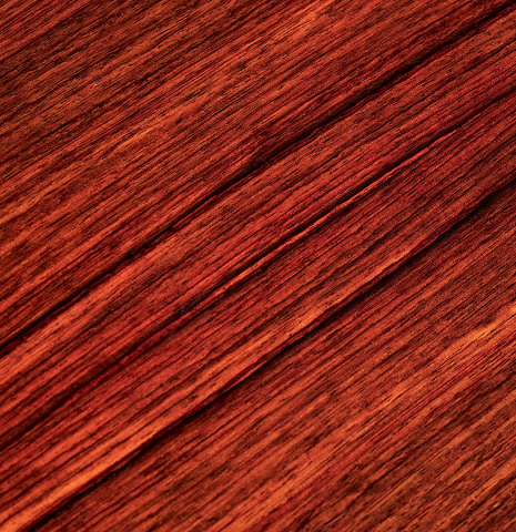 Closeup of the back and center seam of a 2014 Angel Benito Aguado classical guitar made of cedar and Indian rosewood.