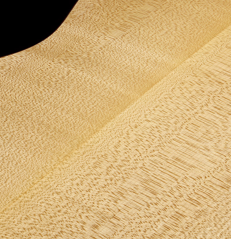 The back center seam of a 2011 Angel Benito Aguado "Romantic" classical guitar made of spruce and maple