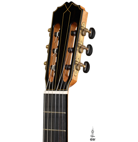The headstock of a 2026 Francesco Baccaglion classical guitar made of spruce and Indian rosewood