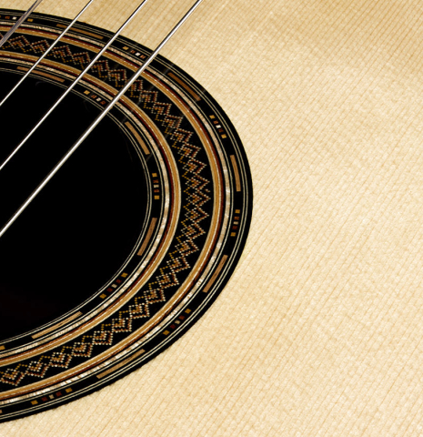 The soundboard and rosette detail of a 2026 Francesco Baccaglion classical guitar made of spruce and Indian rosewood