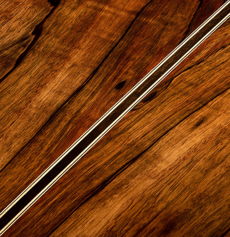 The back center seam of a 2025 Henrik Ballowitz classical guitar made of cedar and African Blackwood