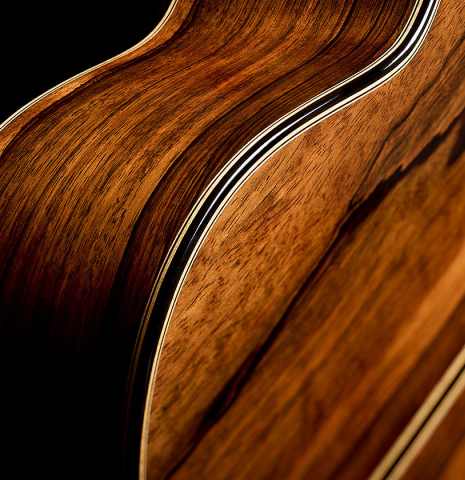 Side-view of the back of a 2025 Henrik Ballowitz classical guitar made of cedar and African Blackwood
