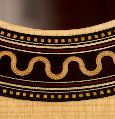Detailed closeup of the rosette pattern of a 2026 Henrik Ballowitz classical guitar made of spruce and Indian rosewood