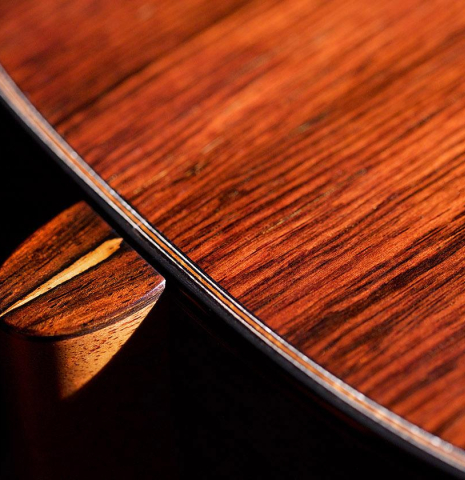 The heel and back of a 2020 Kris Barnett classical guitar made with cedar and African rosewood