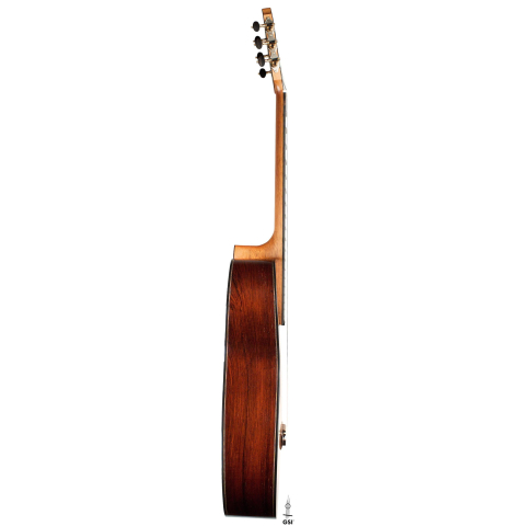 The side of a 2020 Kris Barnett classical guitar made with cedar and African rosewood