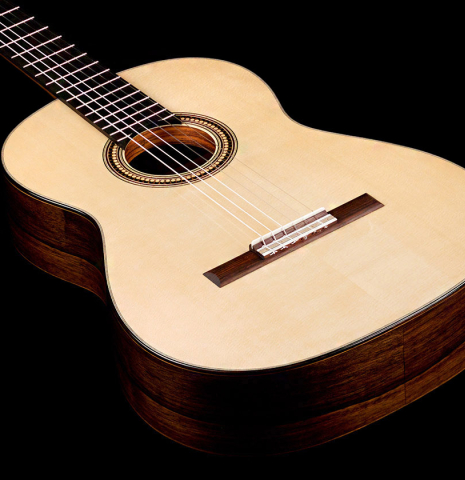 The soundboard of a 2022 Marco Bortolozzo classical guitar made with spruce and exotic ebony