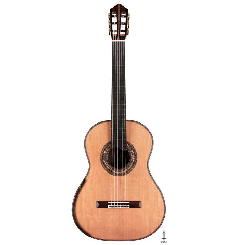 The front of a 2023 Kris Barnett classical guitar made with cedar and exotic ebony