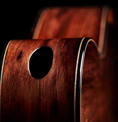 The bass-side rib and soundport of a 2023 Kris Barnett classical guitar made with cedar and exotic ebony
