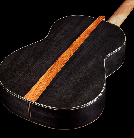 The back and sides of a 2025 Kris Barnett classical guitar made of cedar and exotic ebony