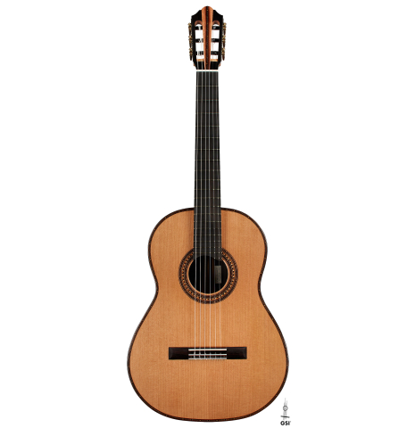 The front of a 2025 Kris Barnett classical guitar made of cedar and exotic ebony