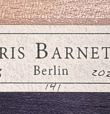 The label of a 2025 Kris Barnett classical guitar made of cedar and exotic ebony