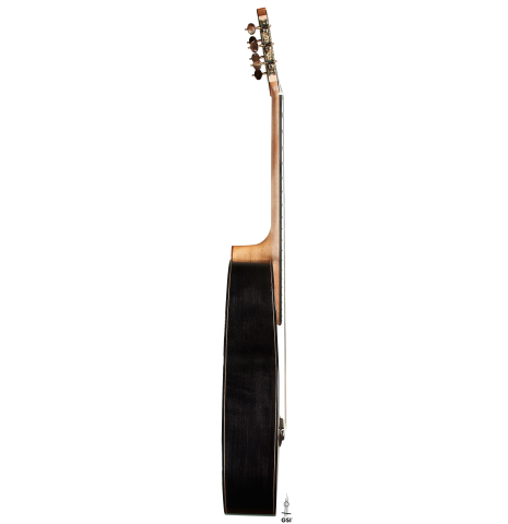 The side of a 2025 Kris Barnett classical guitar made of cedar and exotic ebony