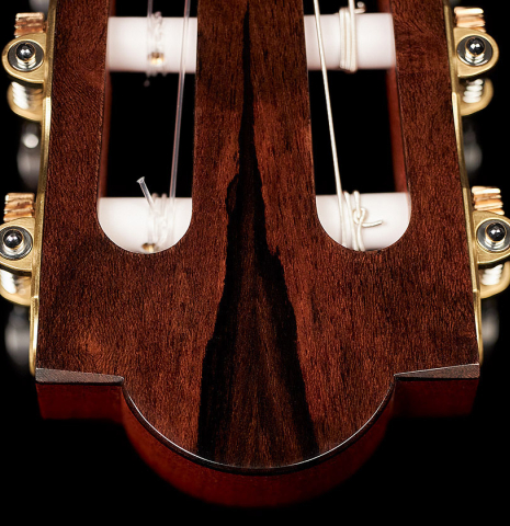 The headstock and tuning machines of a 2023 Marco Bortolozzo classical guitar made with spruce and ziricote
