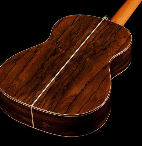 The back and sides of a 2024 Marco Bortolozzo classical guitar made of spruce and ziricote